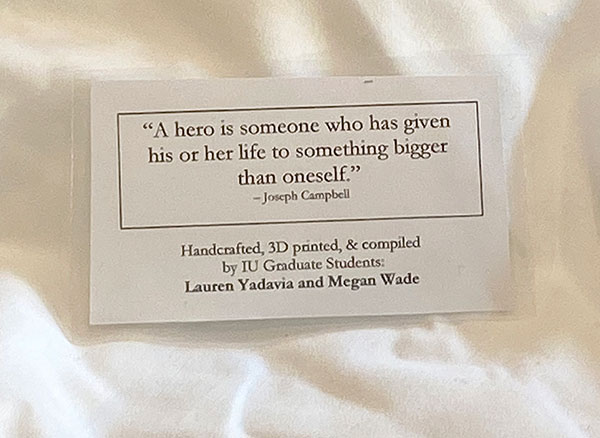 An image of the laminated message attached to the PPE the students distribute. The message reads, "A hero is someone who has given his or her life to do something bigger than oneself." ~ Joseph Campbell